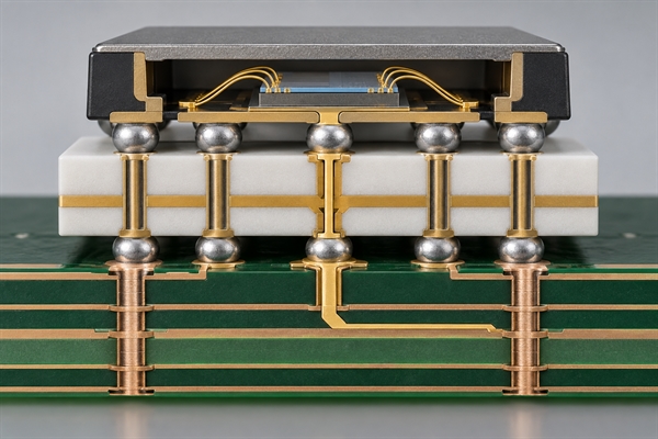 Cross-section of an RF device ceramic interposer and host PCB transition